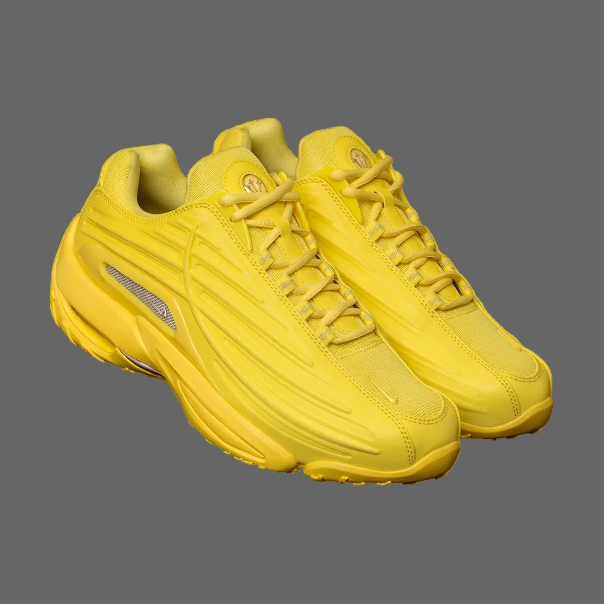 Nike Hot Step 2 Drake NOCTA Opti Yellow – sneaker futuriste jaune vif avec détails réfléchissants et technologie Nike Air, vue de profil