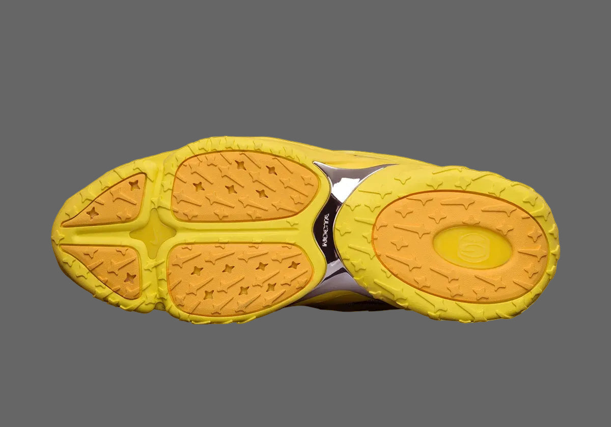 Nike Hot Step 2 Drake NOCTA Opti Yellow – sneaker futuriste jaune vif avec détails réfléchissants et technologie Nike Air, vue de la semelle