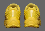 Nike Hot Step 2 Drake NOCTA Opti Yellow – sneaker futuriste jaune vif avec détails réfléchissants et technologie Nike Air, vue de dos