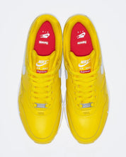 chaussure de ville air max 1 supreme jaune, blanc, semelle confortable, vue de haut
