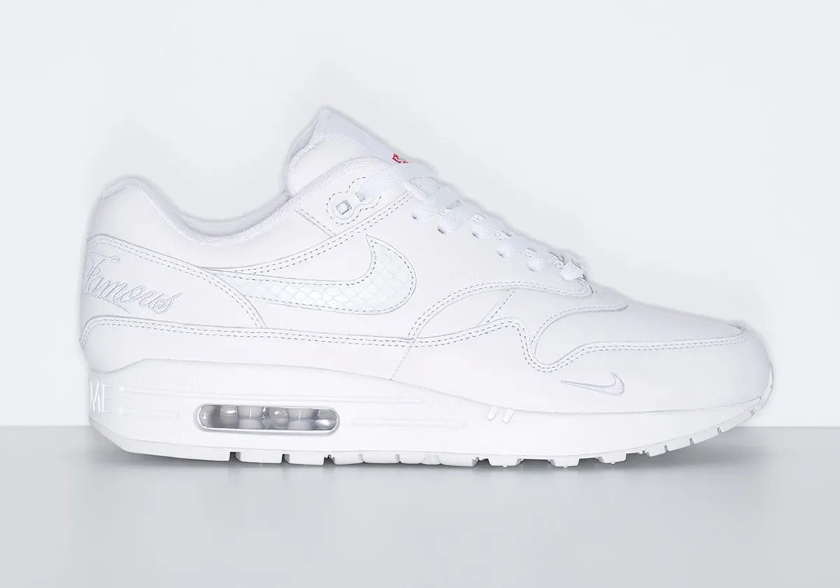 chaussure de ville air max 1 supreme triple white, semelle confortable, vue de profil extérieurs