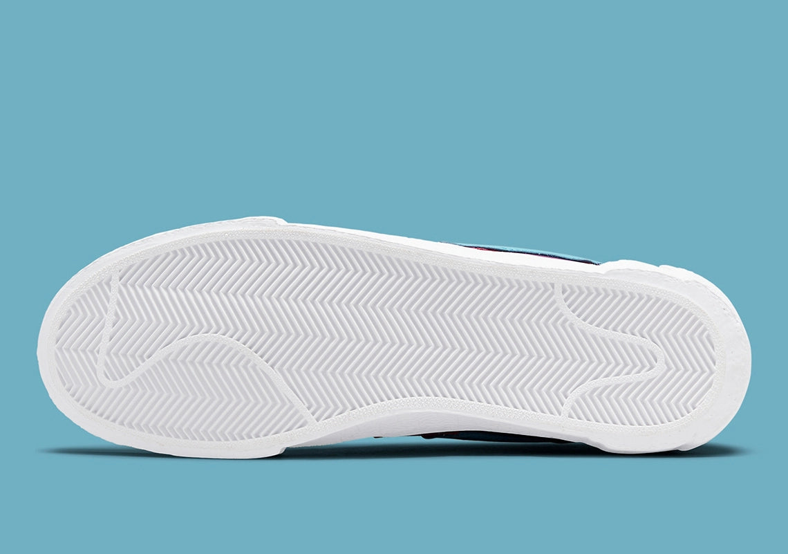 Nike Blazer Low sacai KAWS Purple Dusk – sneaker en cuir violet avec double Swoosh et logo XX de KAWS , vue semelle