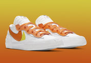 Nike Blazer Low x sacai Magma Orange – sneaker orange vif avec double Swoosh et semelle intermédiaire empilée, vue de profil