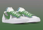 Nike Blazer Low x sacai Classic Green – sneaker verte avec double Swoosh blanc et jaune et semelle empilée, vue de profil