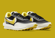 Nike LDWaffle sacai Undercover Black Bright Citron – sneaker noire et jaune avec double Swoosh et semelle empilée, vue de profil