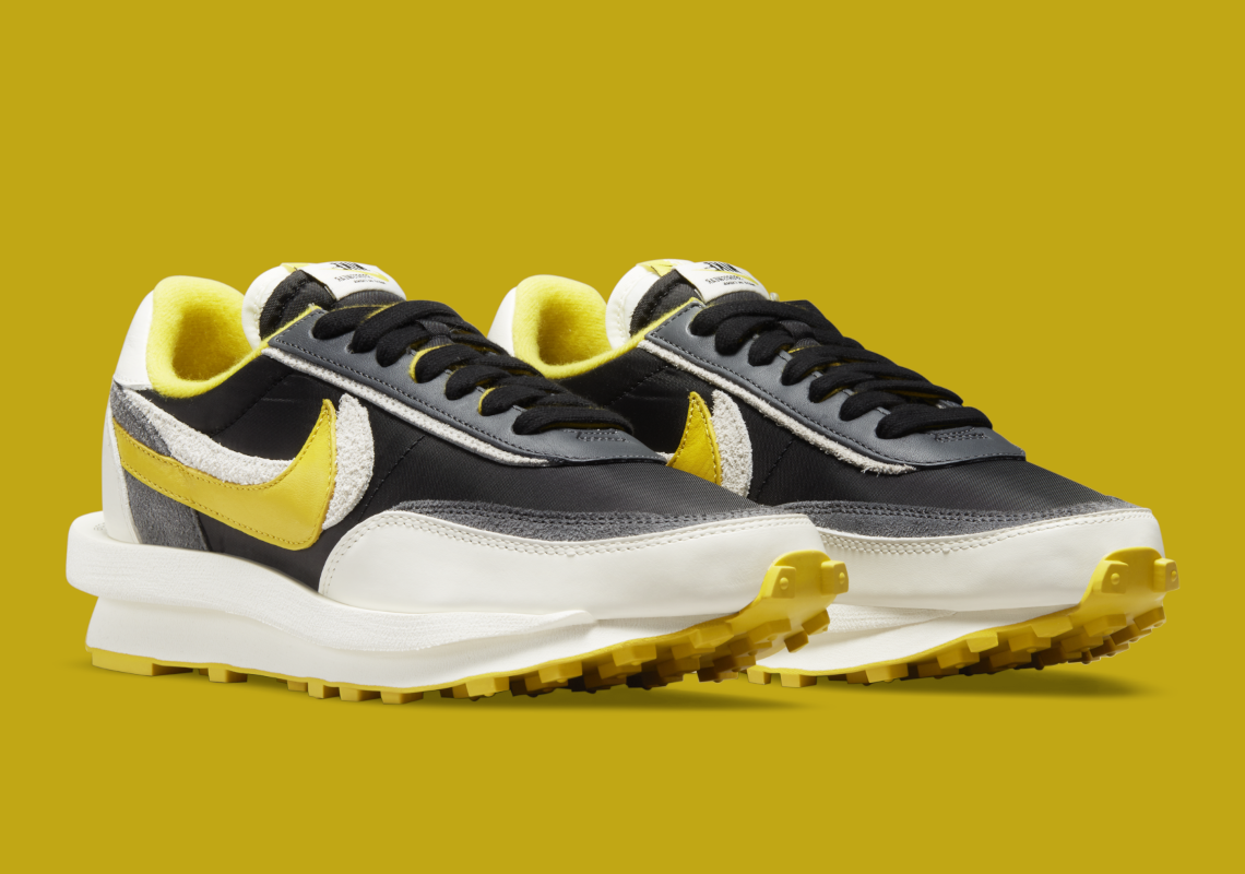 Nike LDWaffle sacai Undercover Black Bright Citron – sneaker noire et jaune avec double Swoosh et semelle empilée, vue de profil