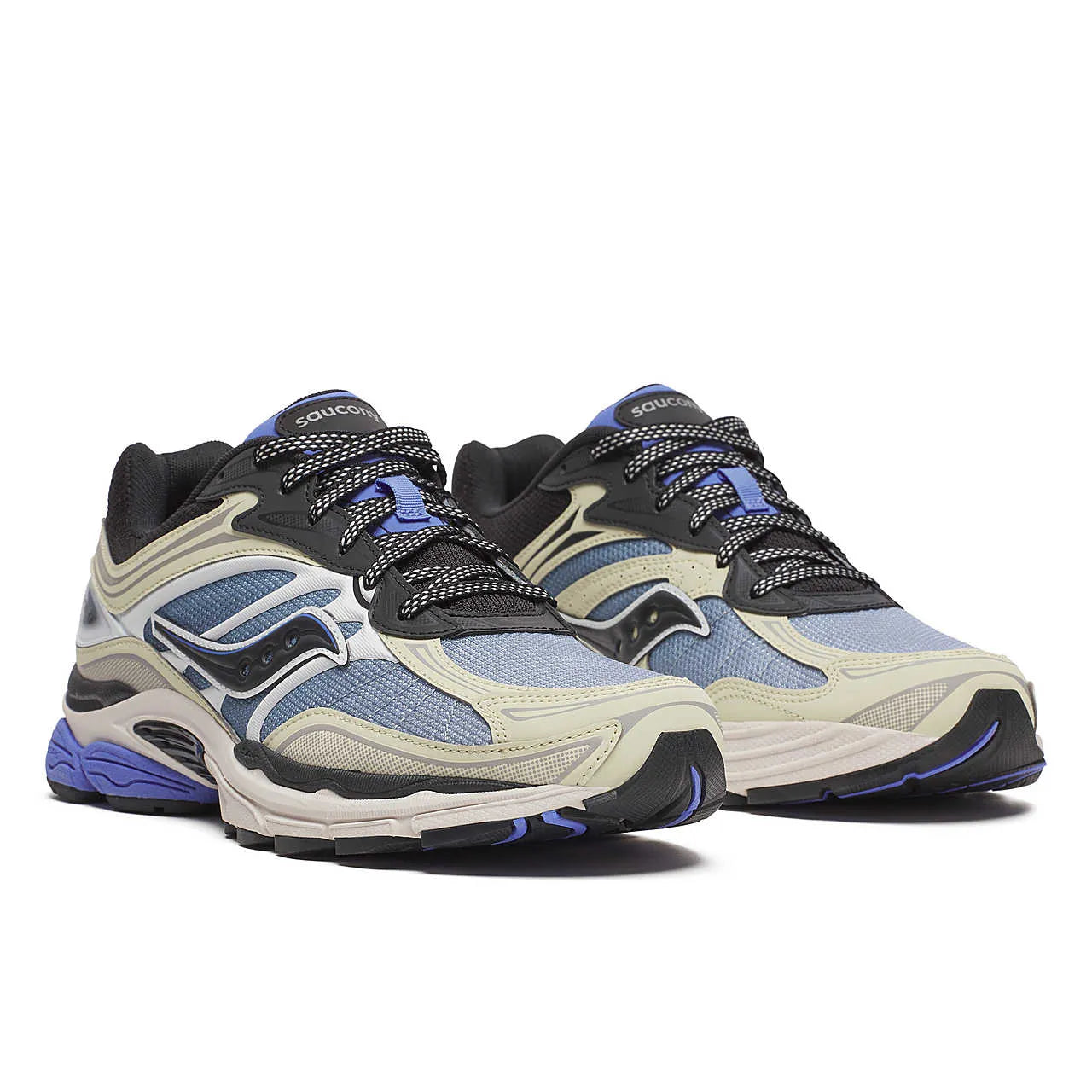 Saucony ProGrid Omni 9 Fade Pack Blue en mesh technique avec dégradé de bleu, amorti ProGrid et design rétro-running.