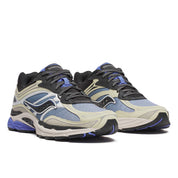 Saucony ProGrid Omni 9 Fade Pack Blue en mesh technique avec dégradé de bleu, amorti ProGrid et design rétro-running.