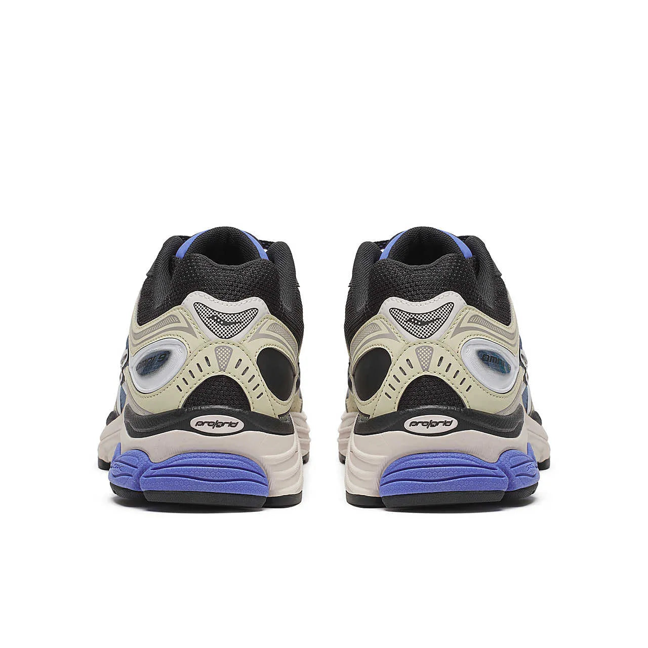 Saucony ProGrid Omni 9 Fade Pack Blue en mesh technique avec dégradé de bleu, amorti ProGrid et design rétro-running.