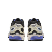 Saucony ProGrid Omni 9 Fade Pack Blue en mesh technique avec dégradé de bleu, amorti ProGrid et design rétro-running.