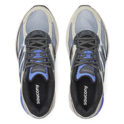 Saucony ProGrid Omni 9 Fade Pack Blue en mesh technique avec dégradé de bleu, amorti ProGrid et design rétro-running.