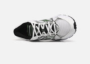 Saucony Ride Millennium blanche avec détails noirs et verts, mesh respirant et semelle amortie GRID.Vue de haut