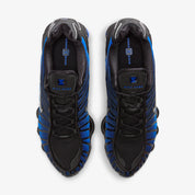 Nike Shox TL Game Royal Black noires avec détails bleu Game Royal et amorti Nike Shox intégral.