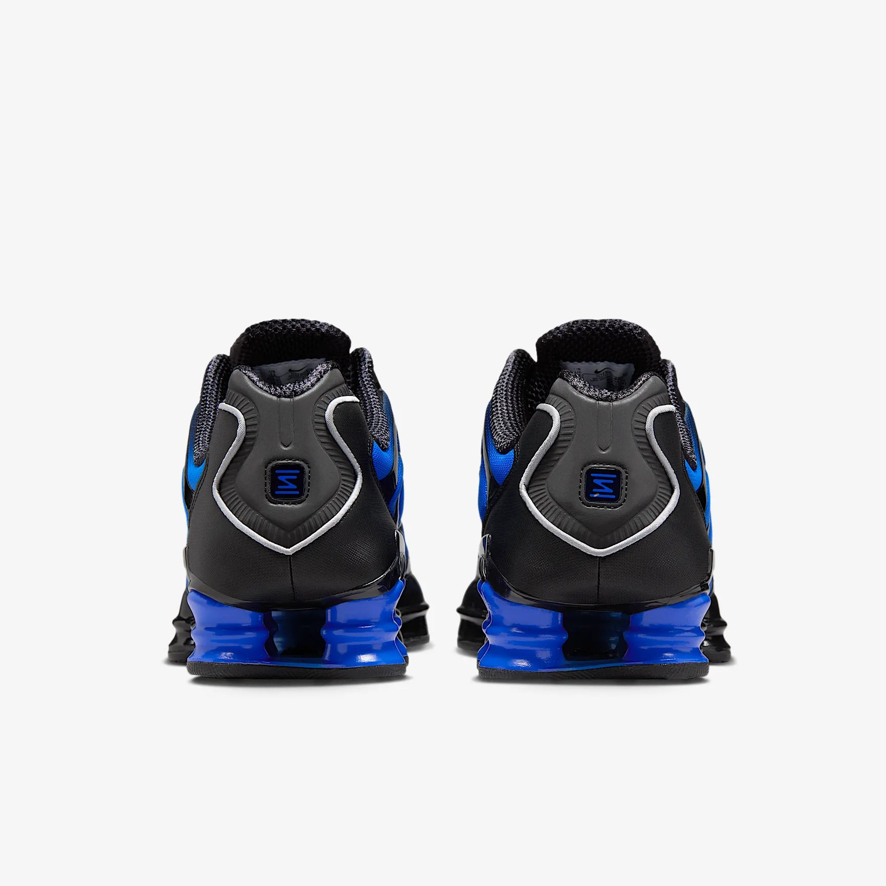 Nike Shox TL Game Royal Black noires avec détails bleu Game Royal et amorti Nike Shox intégral.