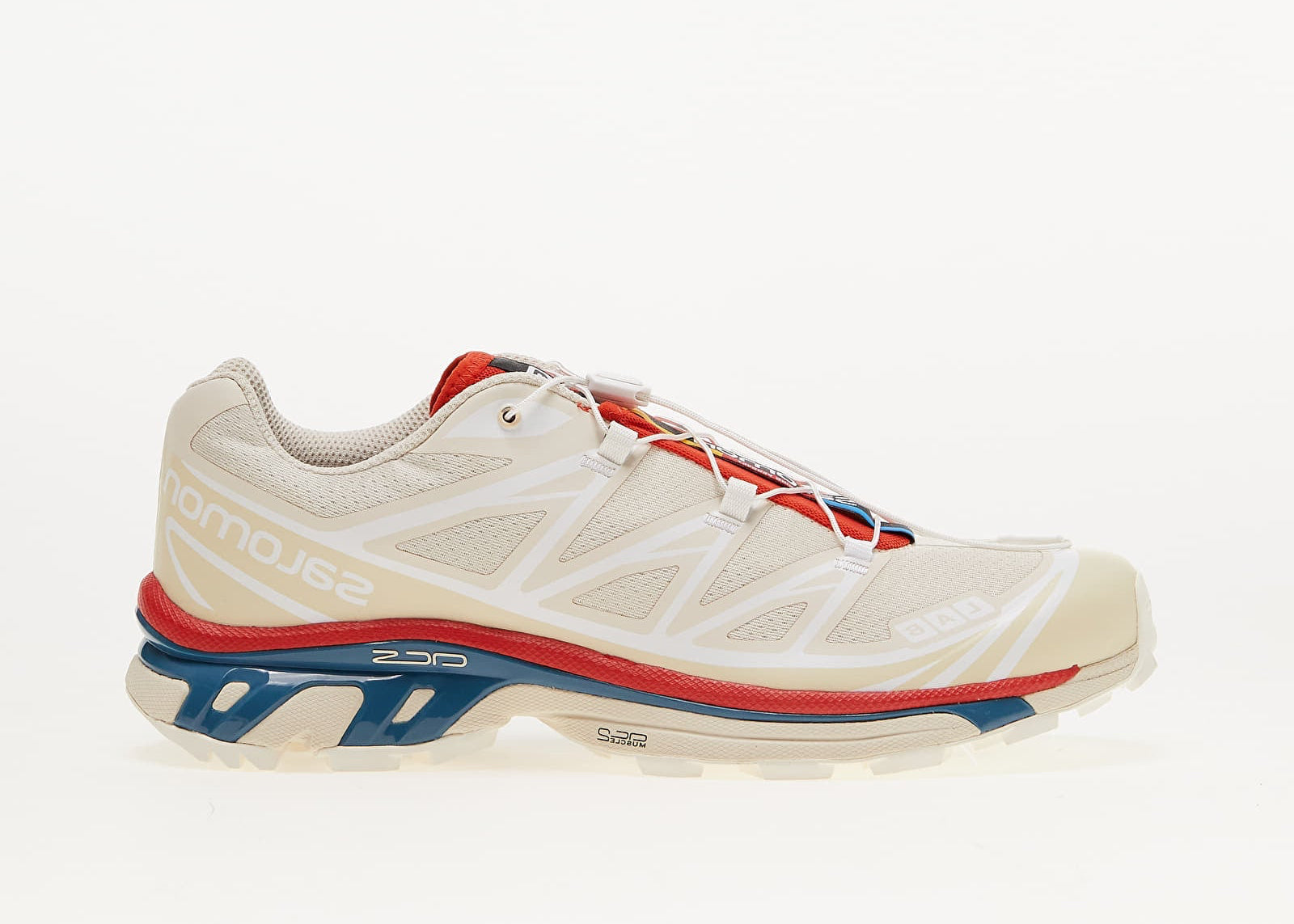 Salomon XT-6 Almond Milk en mesh crème avec système Quicklace, amorti EnergyCell et semelle Contagrip adaptée aux terrains variés.