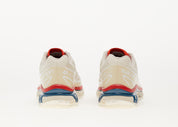 Salomon XT-6 Almond Milk en mesh crème avec système Quicklace, amorti EnergyCell et semelle Contagrip adaptée aux terrains variés.