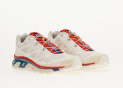 Salomon XT-6 Almond Milk en mesh crème avec système Quicklace, amorti EnergyCell et semelle Contagrip adaptée aux terrains variés.