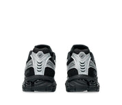 ASICS Gel-Kayano 12.1 Black Pure Silver en mesh noir avec détails argentés métallisés, amorti GEL et silhouette rétro-running technique.