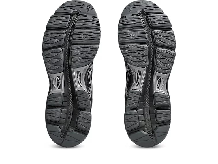 ASICS Gel-Sekiran Black Carbon en mesh noir avec détails gris anthracite, amorti GEL et silhouette technique contemporaine.