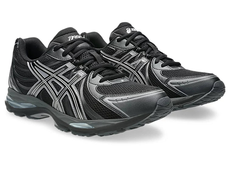 ASICS Gel-Sekiran Black Carbon en mesh noir avec détails gris anthracite, amorti GEL et silhouette technique contemporaine.