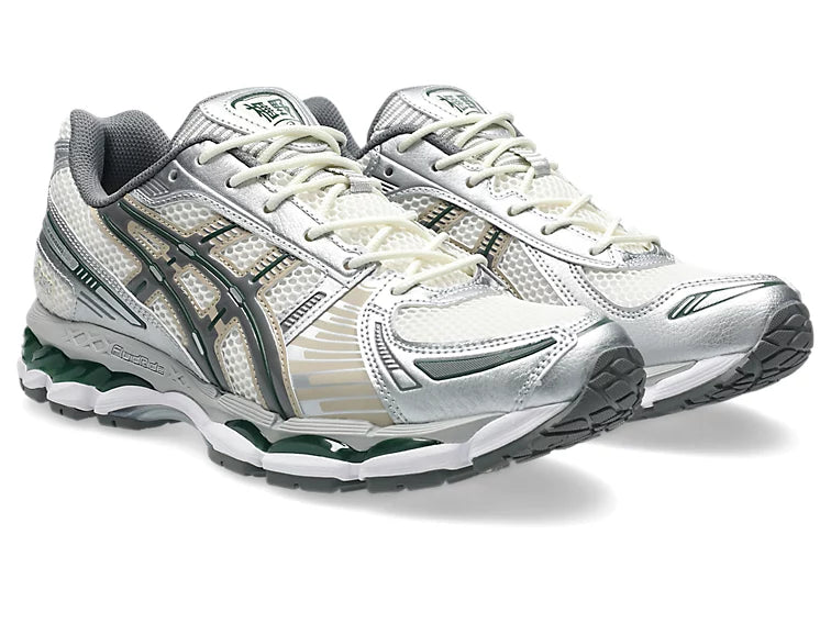 Sneaker ASICS Gel-Kayano 12.1 Cream Carbon en mesh crème et gris anthracite avec amorti GEL et silhouette rétro-running premium.