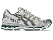 Sneaker ASICS Gel-Kayano 12.1 Cream Carbon en mesh crème et gris anthracite avec amorti GEL et silhouette rétro-running premium.