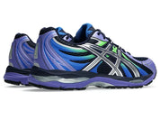 ASICS Gel-Sekiran Midnight Pure Silver en mesh bleu nuit avec détails argentés métallisés, amorti GEL et silhouette technique contemporaine.