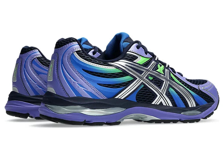 ASICS Gel-Sekiran Midnight Pure Silver en mesh bleu nuit avec détails argentés métallisés, amorti GEL et silhouette technique contemporaine.