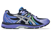 ASICS Gel-Sekiran Midnight Pure Silver en mesh bleu nuit avec détails argentés métallisés, amorti GEL et silhouette technique contemporaine.