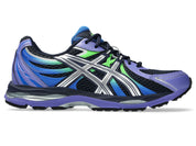 ASICS Gel-Sekiran Midnight Pure Silver en mesh bleu nuit avec détails argentés métallisés, amorti GEL et silhouette technique contemporaine.