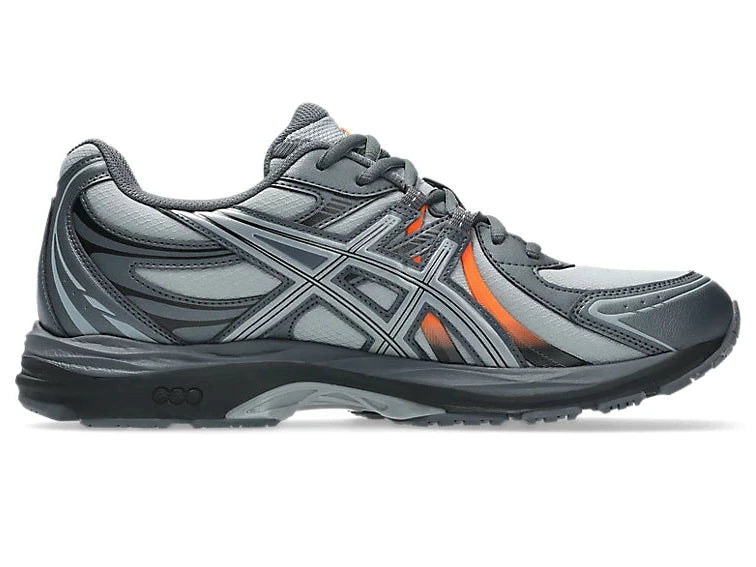 ASICS Gel-Sekiran Piedmont Grey Orange en mesh gris avec détails orange vif, amorti GEL et silhouette technique contemporaine.