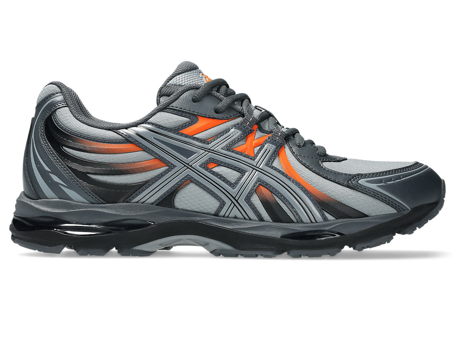 ASICS Gel-Sekiran Piedmont Grey Orange en mesh gris avec détails orange vif, amorti GEL et silhouette technique contemporaine.