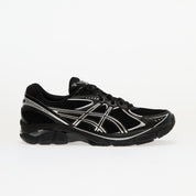 Sneaker ASICS GT-2160 Black Pure Silver en mesh noir avec détails argentés métallisés et amorti GEL performant.