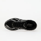 Sneaker ASICS GT-2160 Black Pure Silver en mesh noir avec détails argentés métallisés et amorti GEL performant.