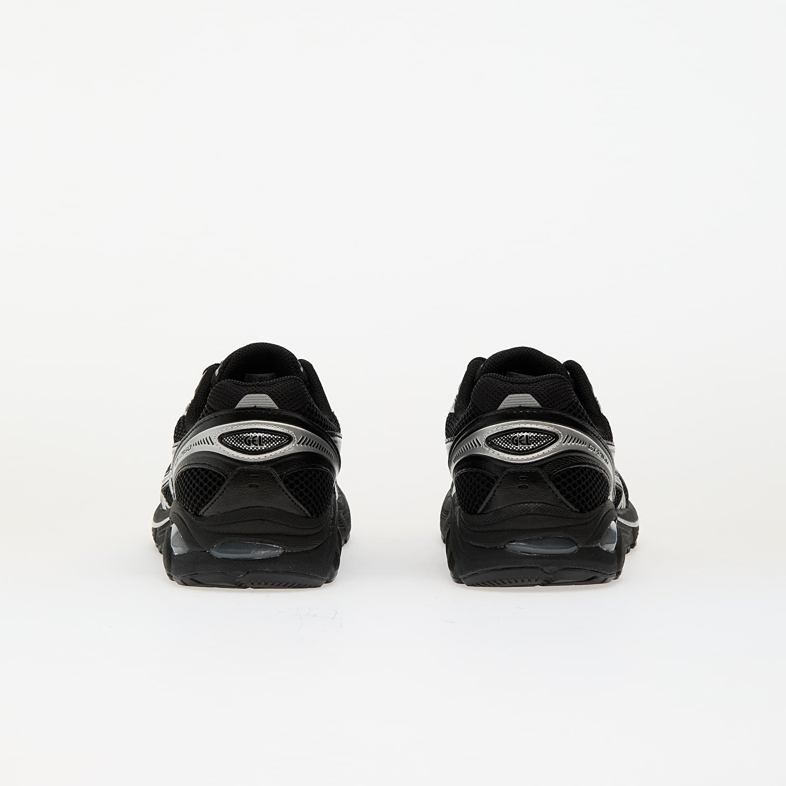 Sneaker ASICS GT-2160 Black Pure Silver en mesh noir avec détails argentés métallisés et amorti GEL performant.