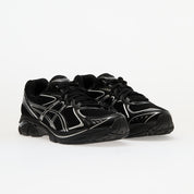 Sneaker ASICS GT-2160 Black Pure Silver en mesh noir avec détails argentés métallisés et amorti GEL performant.