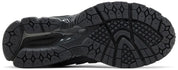 Image de la New Balance 1906R Black Phantom, sneaker noire en mesh et matières synthétiques avec semelle technique N-ergy et amortis ACTEVA Lite et ABZORB SBS. (vue semelle)