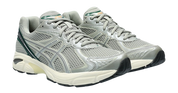 Sneaker ASICS GT-2160 Seal Grey Jewel Green en mesh gris avec détails verts et amorti GEL pour un confort optimal.