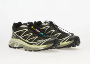 Salomon XT-6 Peat Icicle Lime Cream L49213200 en tons Peat, Icicle et Lime Cream avec mesh technique, renforts TPU et Quicklace™.