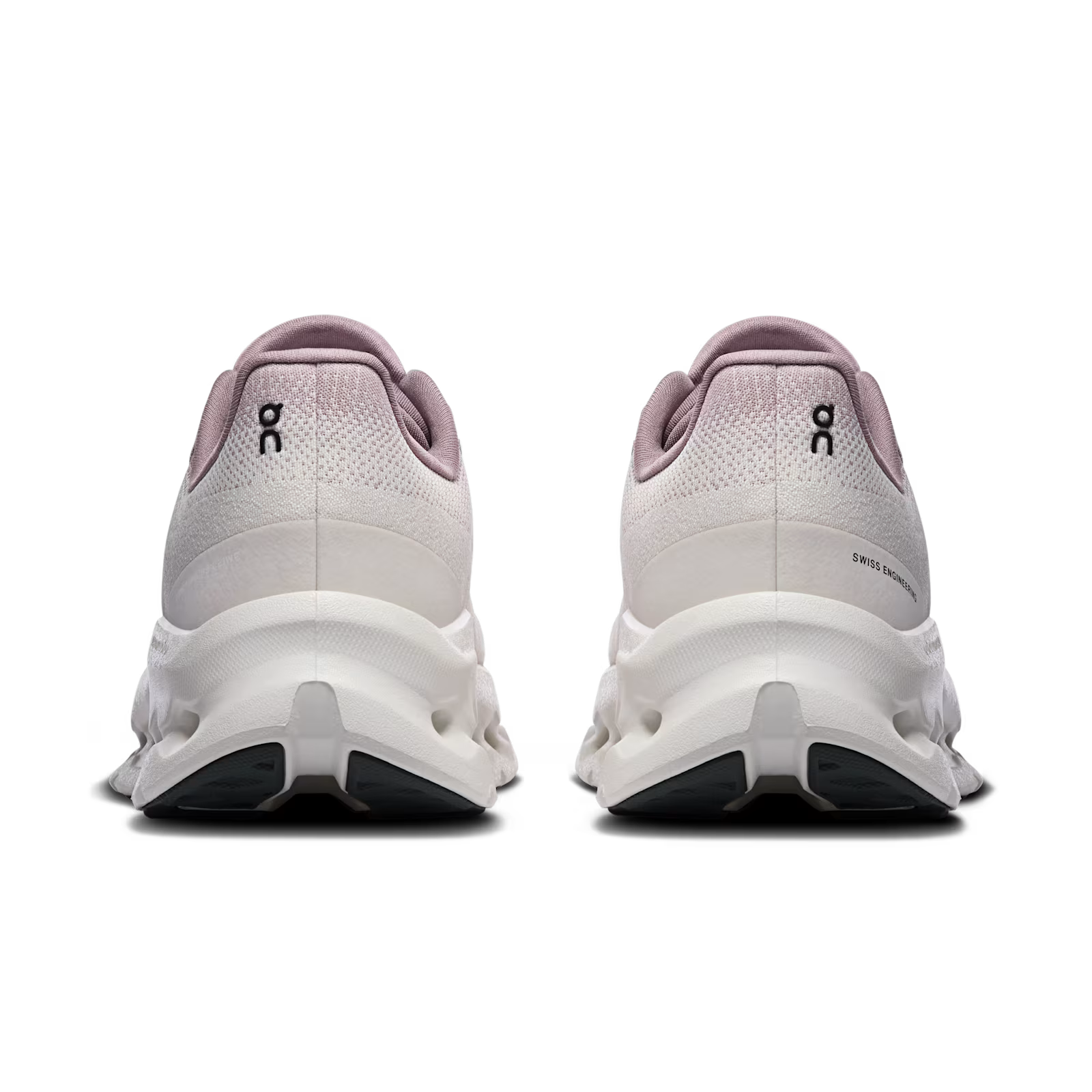 On Running Cloudtilt Heron Dew, sneaker lifestyle On Running coloris Heron et Dew équipée de la technologie CloudTec Phase® et de l'amorti Helion™ vue de derrière. 