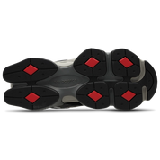 Image de la New Balance 9060 Black Castlerock Grey, sneaker noire et grise en mesh et suède avec semelle épaisse sculptée et technologies ABZORB et SBS. (vue semelle)