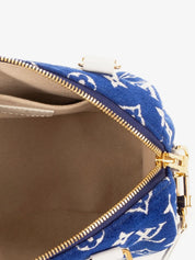 Louis Vuitton Speedy Bandoulière 20 Blue, sac Louis Vuitton bleu au format compact avec doubles poignées Toron et bandoulière ajustable.