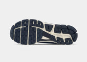 Sneakers Nike Zoom Vomero 5 SE en Blue Void et Midnight Navy avec mesh respirant et amorti Zoom Air premium.