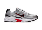 Nike Initiator Metallic Silver Red en mesh Metallic Silver, blanc et noir avec renforts superposés et silhouette rétro-running vue de profil intérieur. 