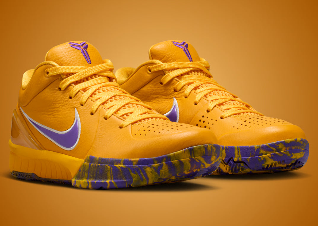 Nike Kobe 4 Draft Day Pack Los Angeles Lakers (GS) avec tige en mesh respirant, empiècements synthétiques blancs, violets et dorés, silhouette basse de basketball et semelle extérieure en caoutchouc.