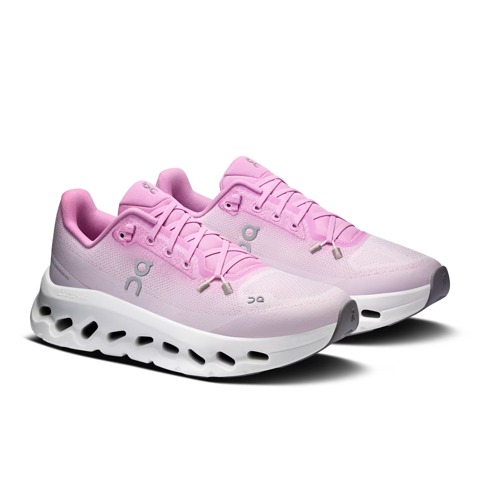 On Running Cloudtilt Bloom Sakura, sneaker lifestyle rose On Running équipée de la technologie CloudTec Phase® et de l'amorti Helion™ vue de 3/4 face. 