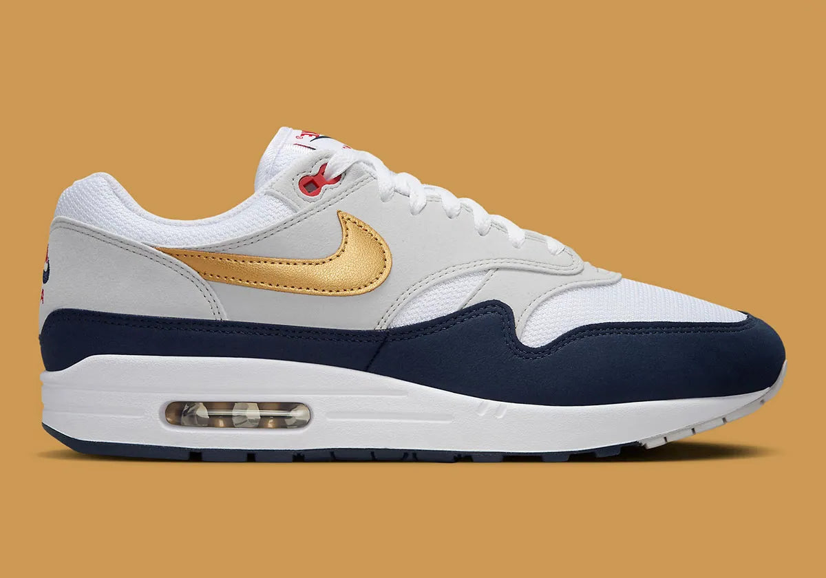  Chaussure de rue Nike Air Max 1 Olympic bleu , blanc , dorée , gris , semelle confortable , vue de profil