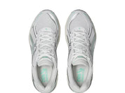Sneaker ASICS GT-2160 White Ice Green en mesh blanc avec détails vert glacé, amorti GEL et silhouette rétro-running technique.