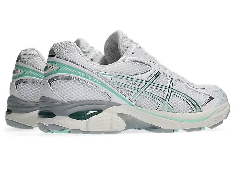 Sneaker ASICS GT-2160 White Ice Green en mesh blanc avec détails vert glacé, amorti GEL et silhouette rétro-running technique.