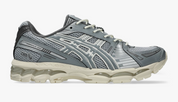ASICS Gel-Kayano 12.1 Piedmont Grey Gravel grise avec mesh respirant, empiècements techniques et semelle GEL FLUIDRIDE.